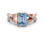 Fancy Blue Emerald Cut Diamond Solitaire Ring in Rose gold with Interwoven Pavé Band and Prong Setting