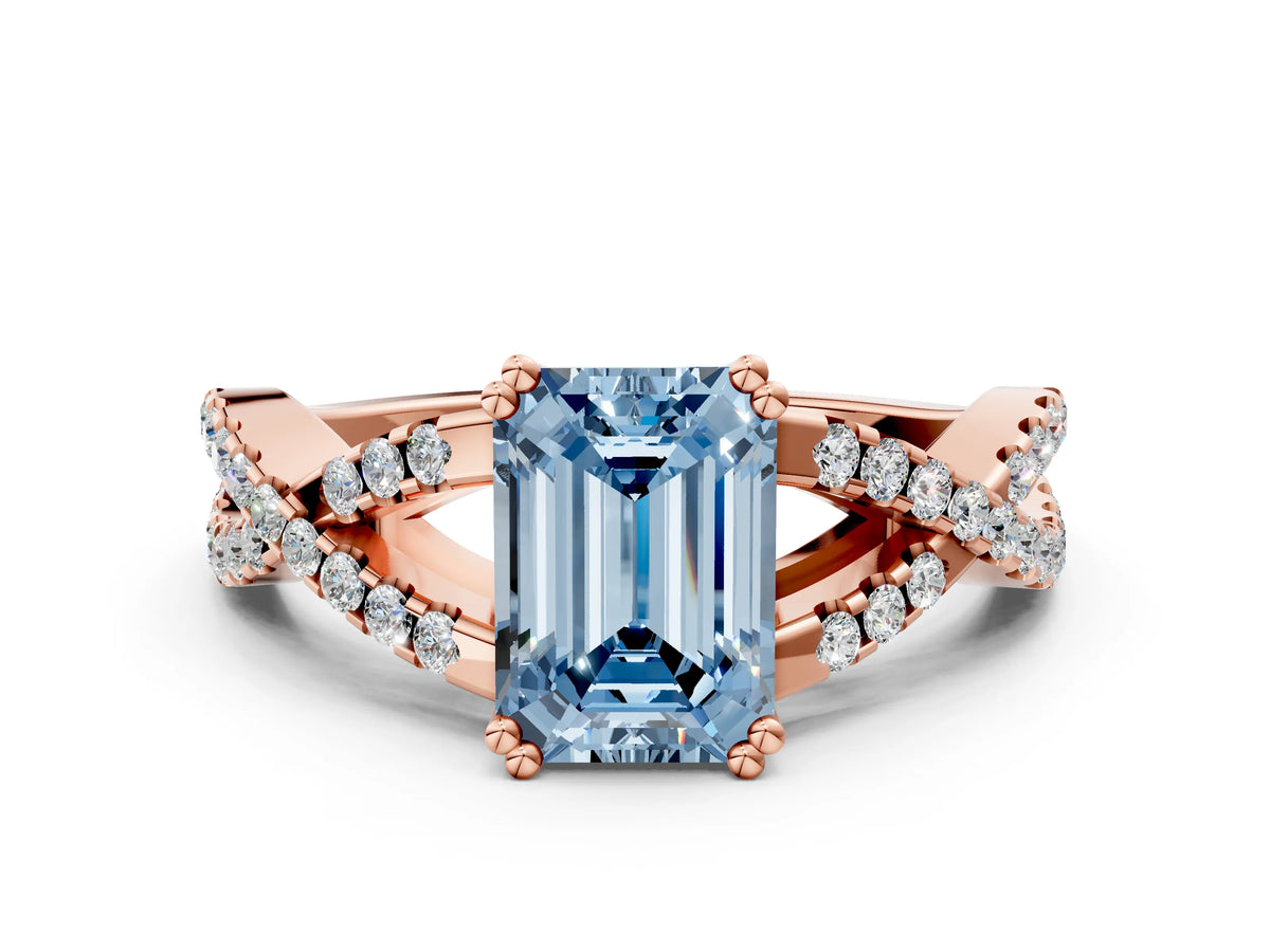 Fancy Blue Emerald Cut Diamond Solitaire Ring in Rose gold with Interwoven Pavé Band and Prong Setting