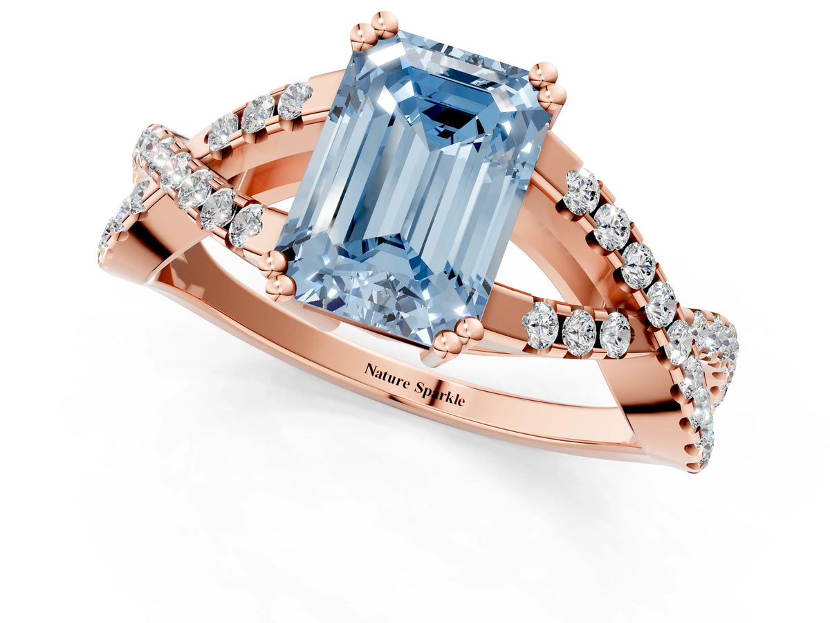 Fancy Blue Emerald Cut Diamond Solitaire Ring in Rose gold with Interwoven Pavé Band and Prong Setting_1