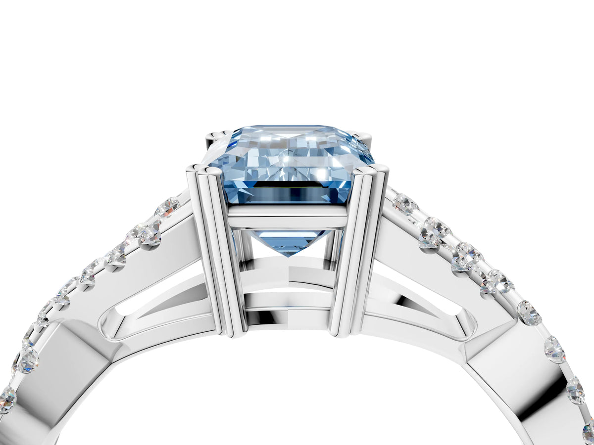 Fancy Blue Emerald Cut Diamond Solitaire Ring in Silver with Interwoven Pavé Band and Prong Setting_10