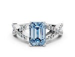 Fancy Blue Emerald Cut Diamond Solitaire Ring in White gold with Interwoven Pavé Band and Prong Setting