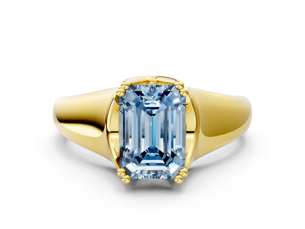 Fancy Blue Emerald Cut Diamond Solitaire Ring in Yellow gold with Smooth Wide Band and Prong Setting