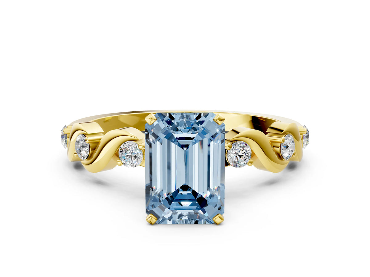 Fancy Blue Emerald Cut Diamond Solitaire Ring in Yellow gold with Twisted Ribbon Band and Round Accents