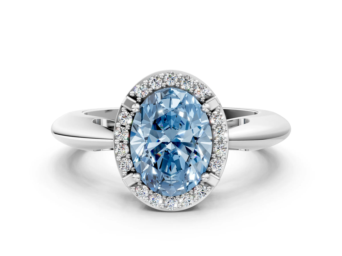Fancy Blue Oval Cut Diamond Halo Engagement Ring in White gold with Plain Split Shank and Prong Setting