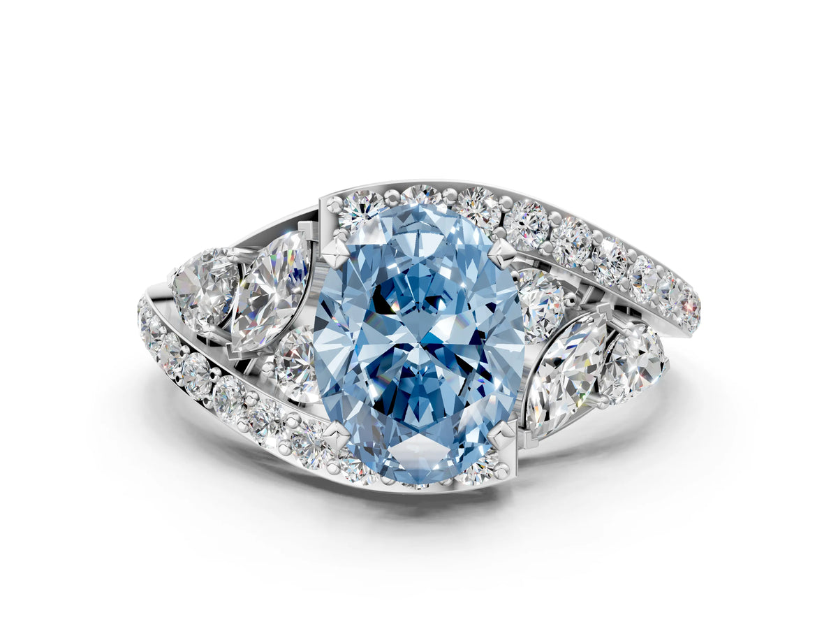 Fancy Blue Oval Cut Diamond Halo Ring in White gold with Marquise and Pavé Band in Prong Setting