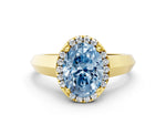 Fancy Blue Oval Cut Diamond Halo Ring in Yellow gold with Cathedral Band and Prong Setting
