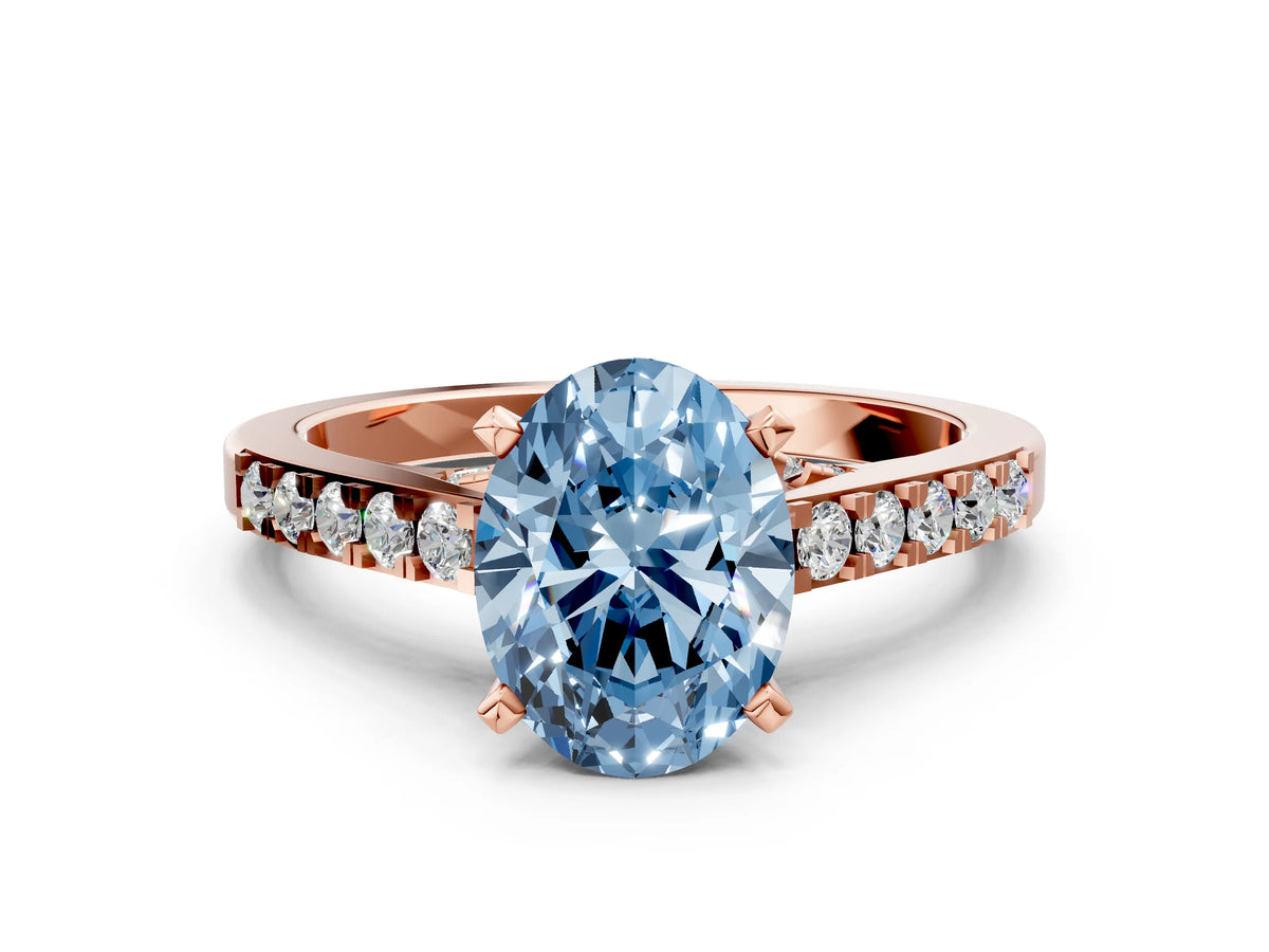 Fancy Blue Oval Cut Diamond Solitaire Ring in Rose gold with Crossover Gallery and Round Pavé Band