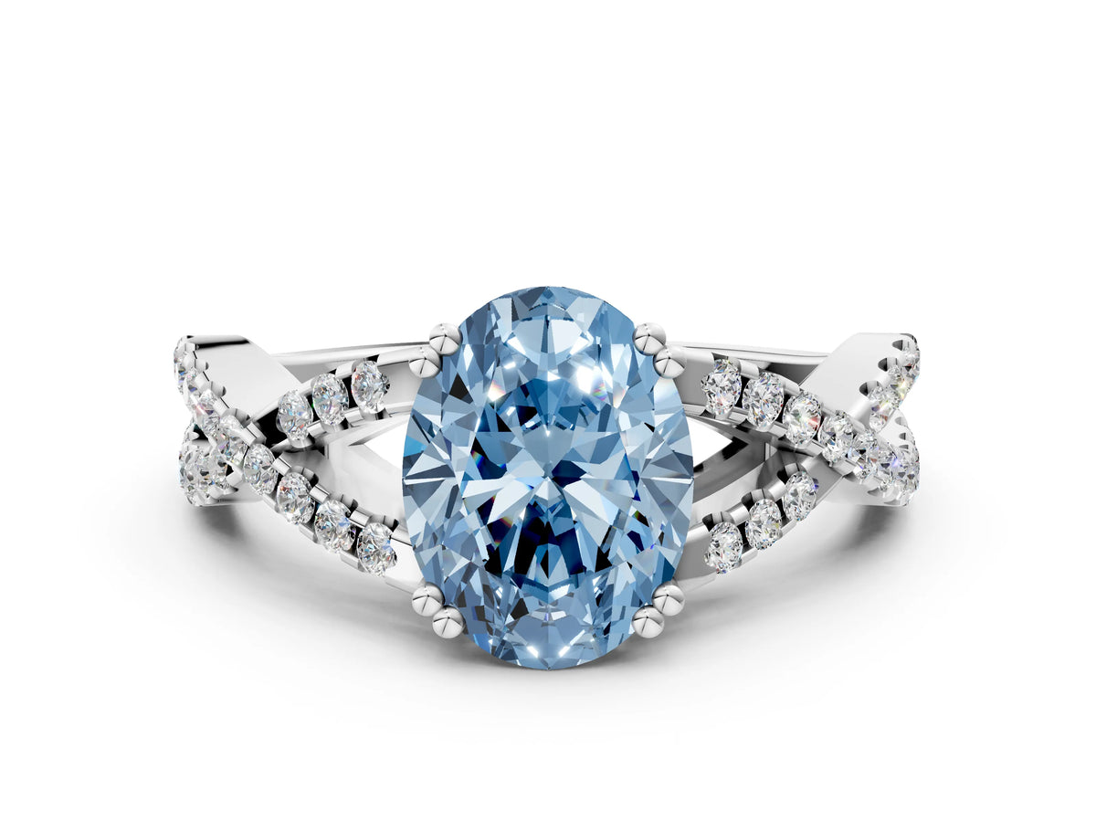 Fancy Blue Oval Cut Diamond Solitaire Ring in White gold with Interwoven Pavé Band and Prong Setting