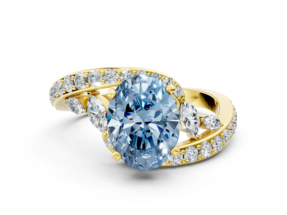 Fancy Blue Oval Cut Diamond Solitaire Ring in Yellow gold with Pavé Twist Band and Prong Setting
