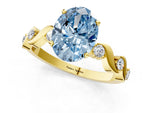 Fancy Blue Oval Cut Diamond Solitaire Ring in Yellow gold with Twisted Ribbon Band and Round Accents_1