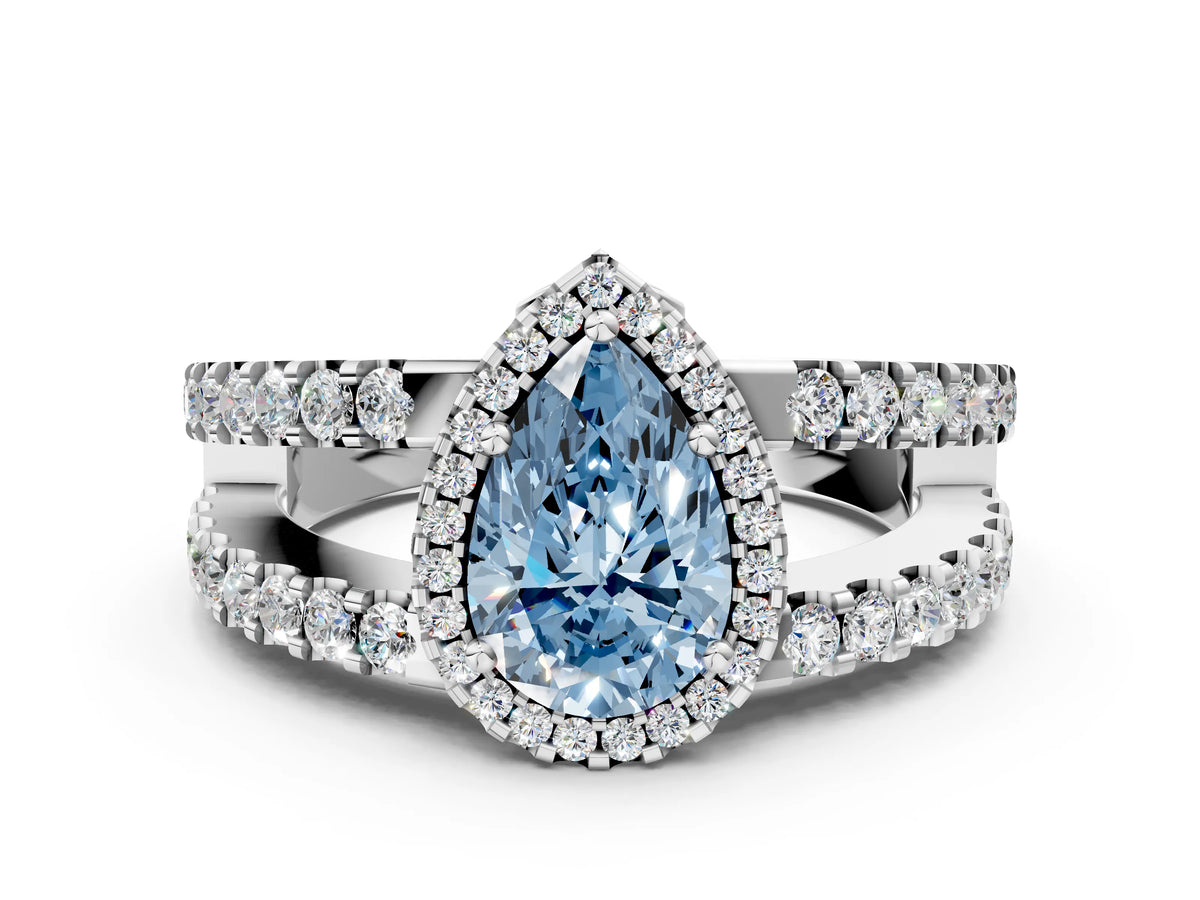 Fancy Blue Pear Cut Diamond Halo Ring in White gold with Split Shank Band and Prong Setting