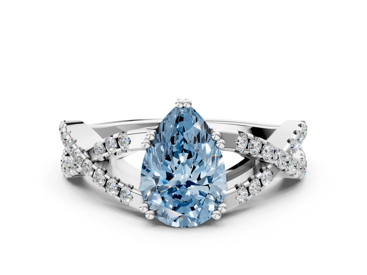 Fancy Blue Pear Cut Diamond Solitaire Ring in White gold with Interwoven Pavé Band and Prong Setting