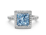 Fancy Blue Princess Cut Diamond Halo Engagement Ring in White gold with Milgrain Detail and Pavé Band