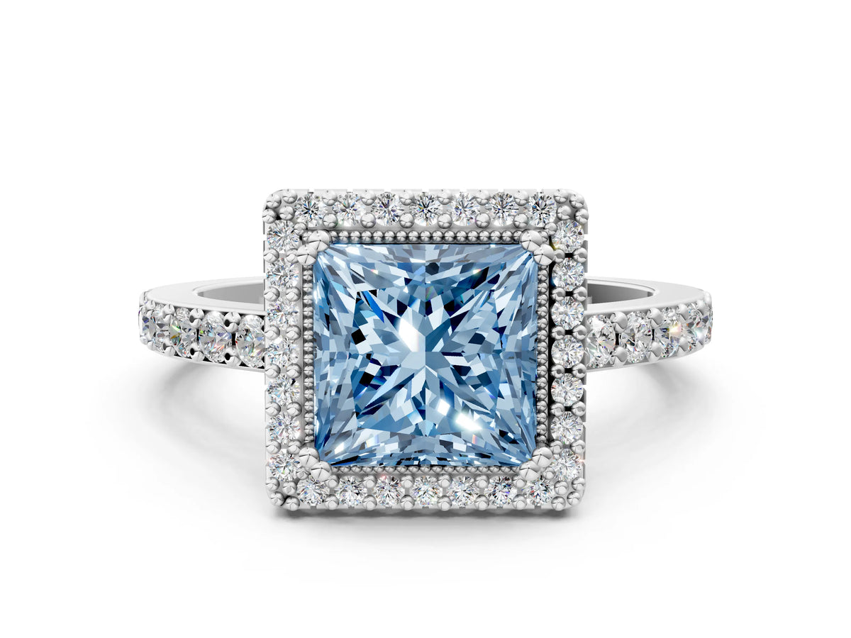 Fancy Blue Princess Cut Diamond Halo Engagement Ring in White gold with Milgrain Detail and Pavé Band