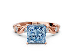 Fancy Blue Princess Cut Diamond Solitaire Ring in Rose gold with Twisted Ribbon Band and Round Accents