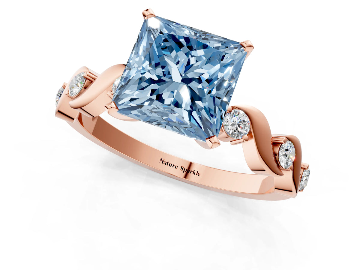 Fancy Blue Princess Cut Diamond Solitaire Ring in Rose gold with Twisted Ribbon Band and Round Accents_1