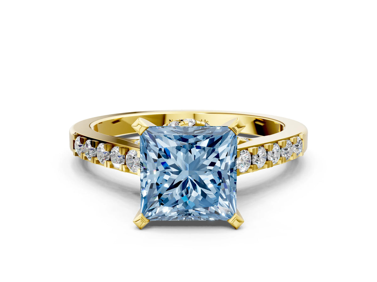 Fancy Blue Princess Cut Diamond Solitaire Ring in Yellow gold with Crossover Gallery and Round Pavé Band