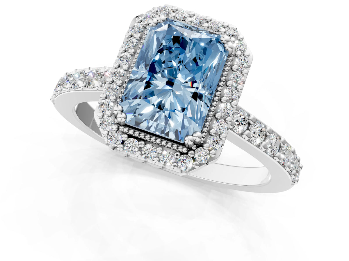 Fancy Blue Radiant Cut Diamond Halo Engagement Ring in White gold with Milgrain Detail and Pavé Band_1