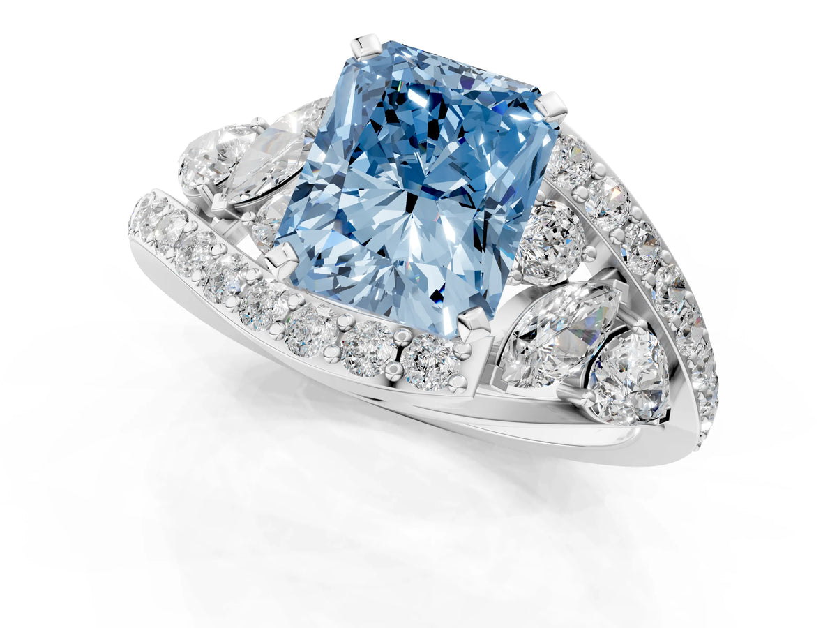 Fancy Blue Radiant Cut Diamond Halo Ring in White gold with Marquise and Pavé Band in Prong Setting_1