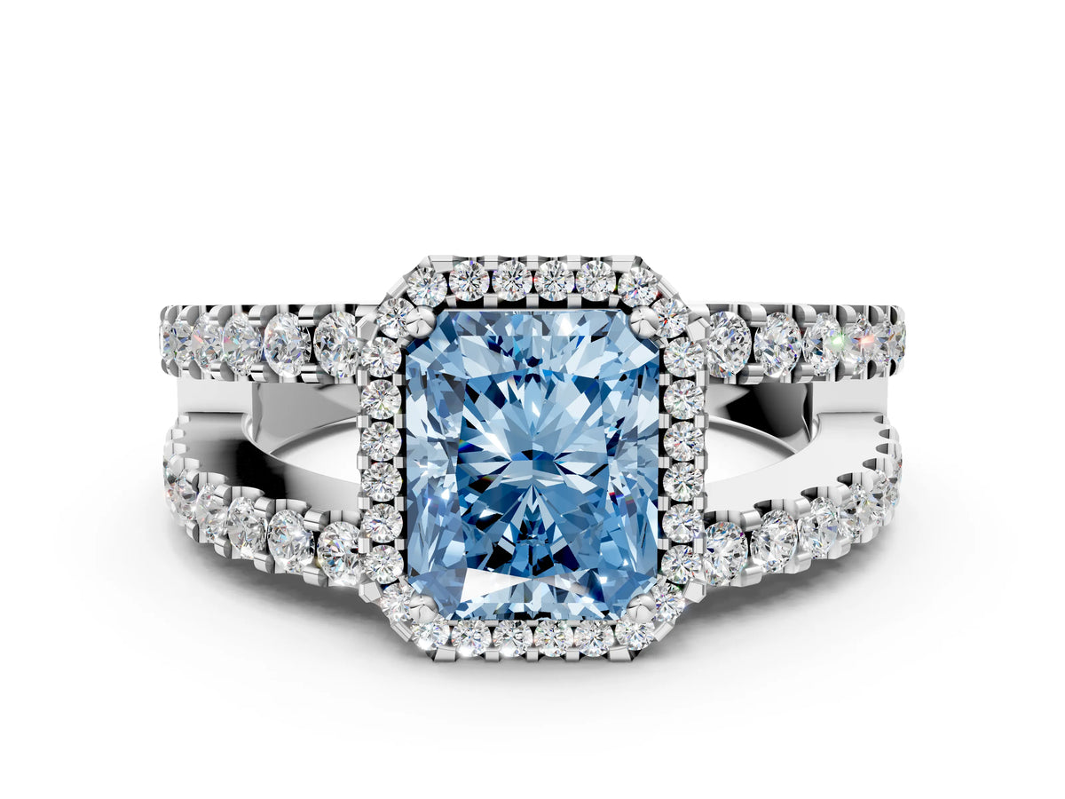 Fancy Blue Radiant Cut Diamond Halo Ring in White gold with Split Shank Band and Prong Setting
