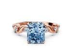Fancy Blue Radiant Cut Diamond Solitaire Ring in Rose gold with Twisted Ribbon Band and Round Accents