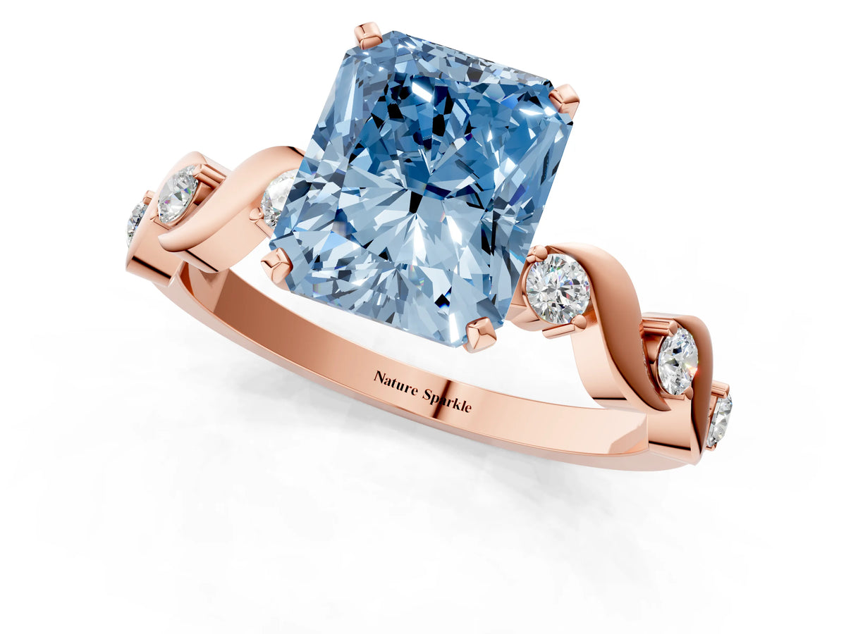 Fancy Blue Radiant Cut Diamond Solitaire Ring in Rose gold with Twisted Ribbon Band and Round Accents_1