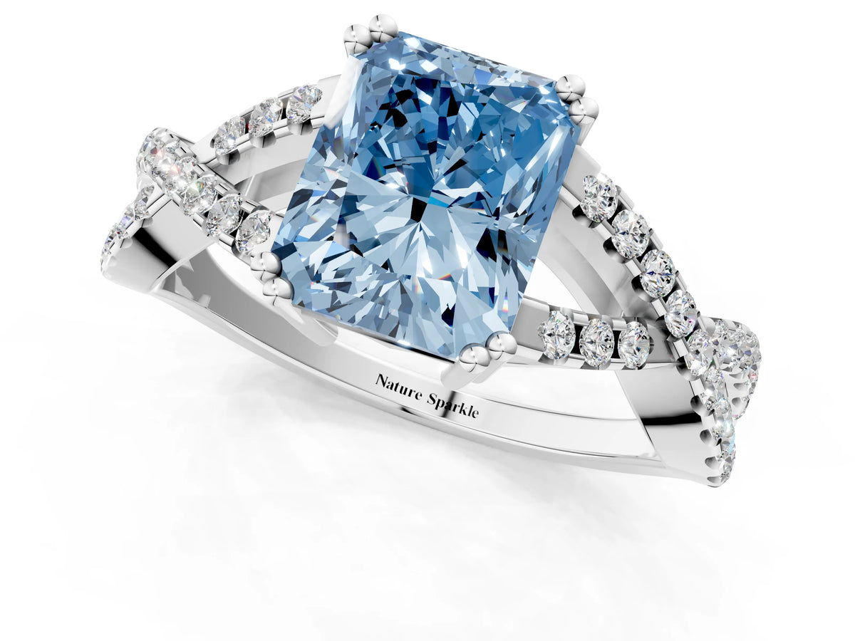Fancy Blue Radiant Cut Diamond Solitaire Ring in White gold with Interwoven Pavé Band and Prong Setting_1