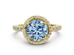 Fancy Blue Round Cut Diamond Halo Engagement Ring in Yellow gold with Milgrain Detail and Pavé Band