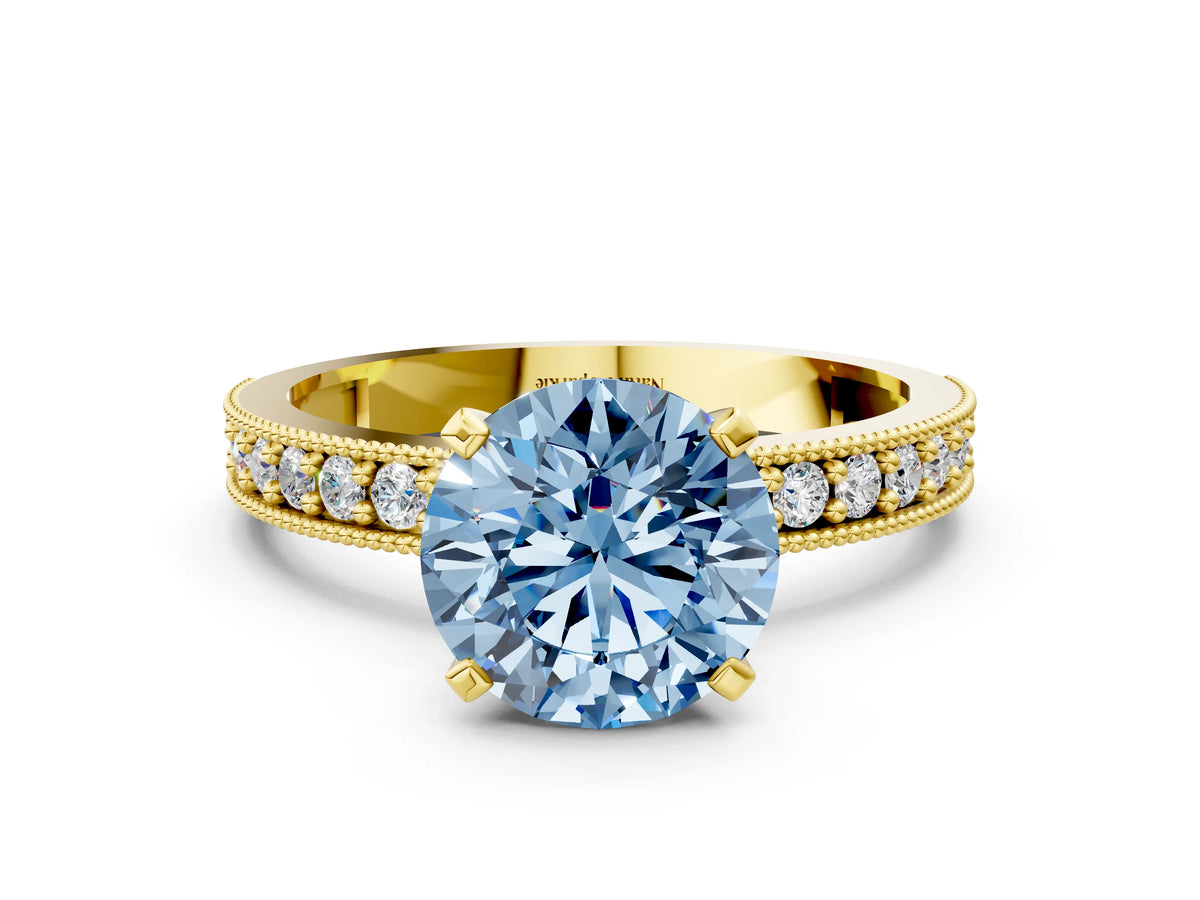 Fancy Blue Round Cut Diamond Milgrain Pavé Engagement Ring in Yellow gold with Prong Setting