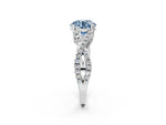 Fancy Blue Round Cut Diamond Solitaire Ring in Platinum with Interwoven Pavé Band and Prong Setting_8