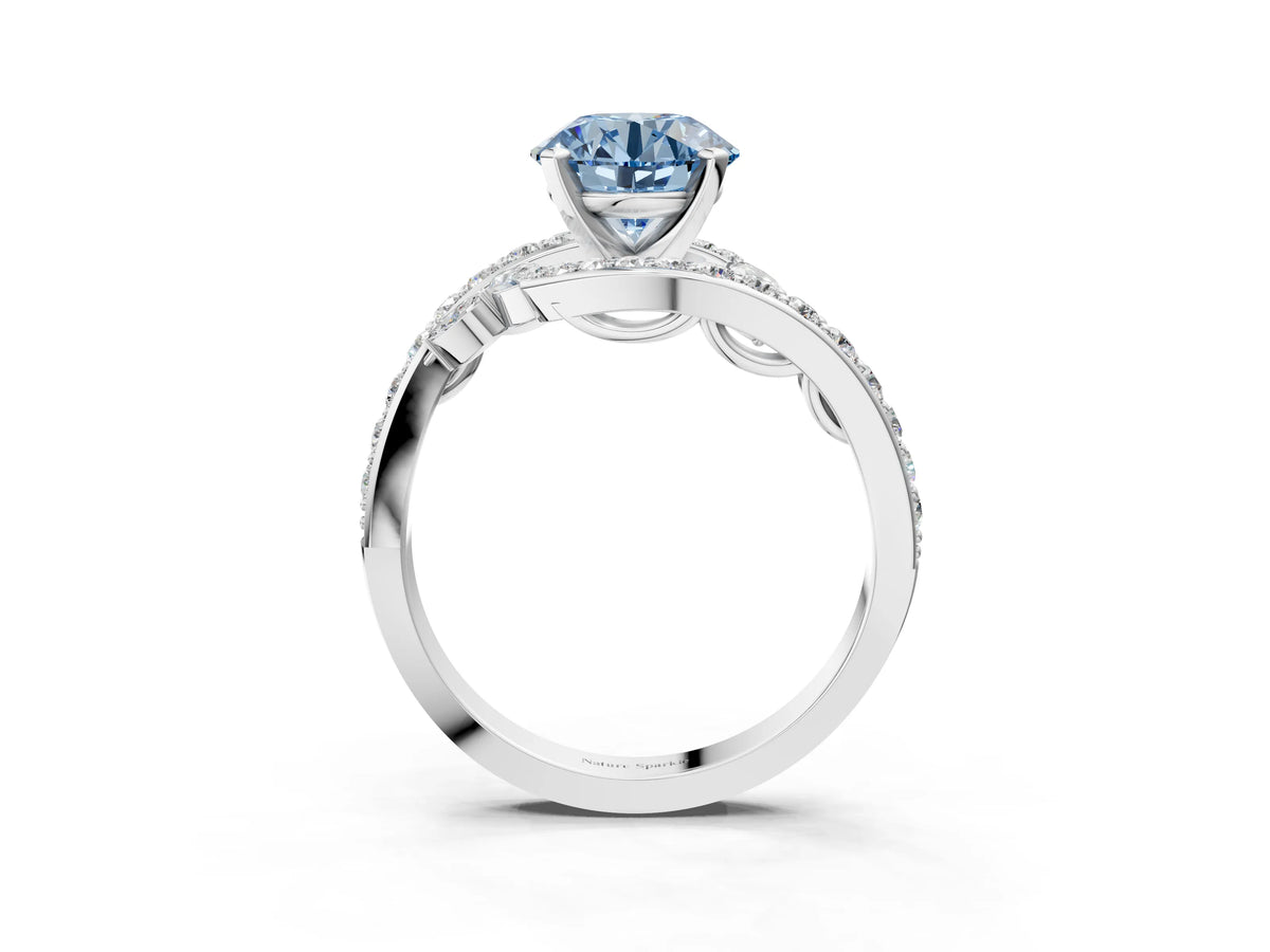 Fancy Blue Round Cut Diamond Solitaire Ring in Silver with Pavé Twist Band and Prong Setting_15