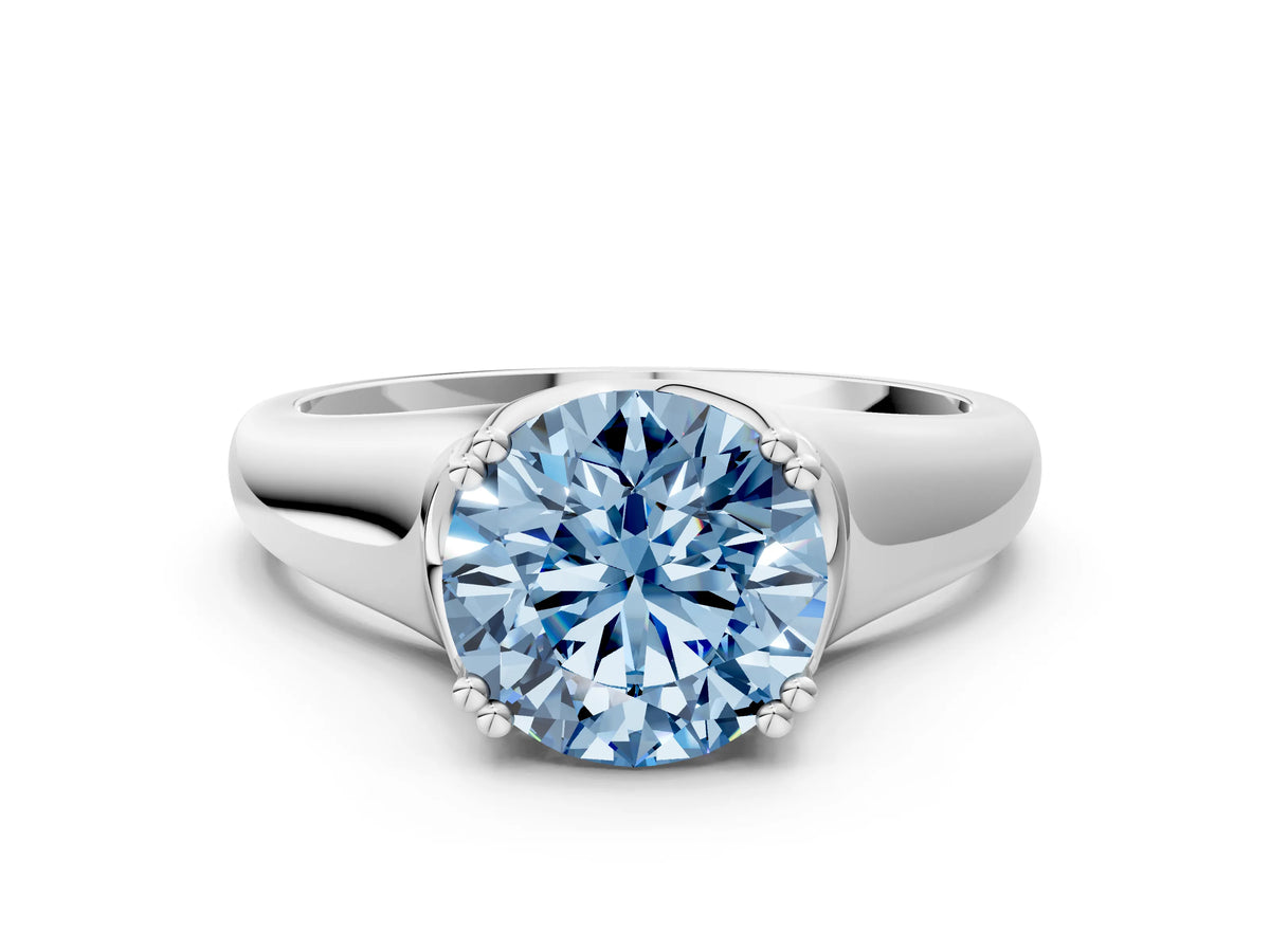 Fancy Blue Round Cut Diamond Solitaire Ring in White gold with Smooth Wide Band and Prong Setting
