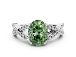 Fancy Green Oval Cut Diamond Solitaire Ring in White gold with Interwoven Pavé Band and Prong Setting