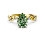 Fancy Green Pear Cut Diamond Solitaire Ring in Yellow gold with Twisted Ribbon Band and Round Accents