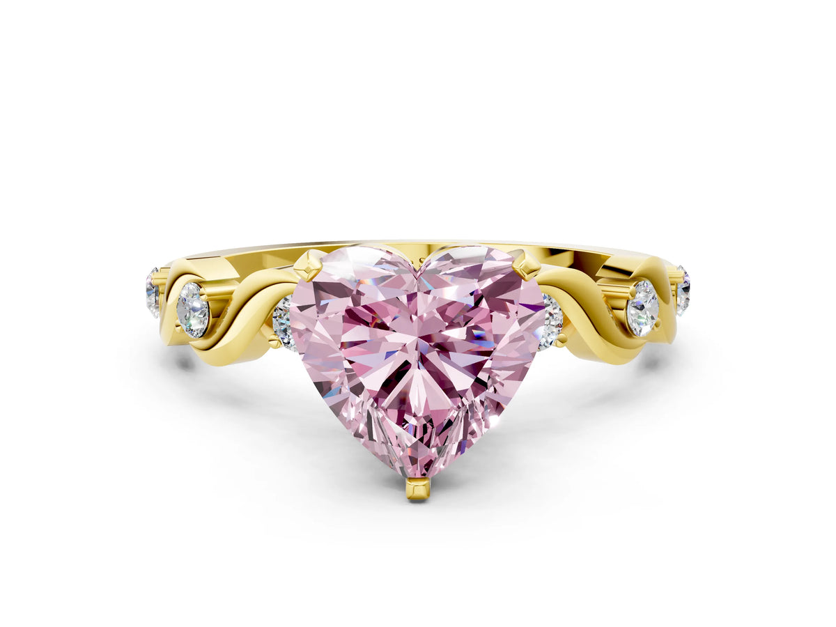 Fancy Pink Heart Cut Diamond Solitaire Ring in Yellow gold with Twisted Ribbon Band and Round Accents