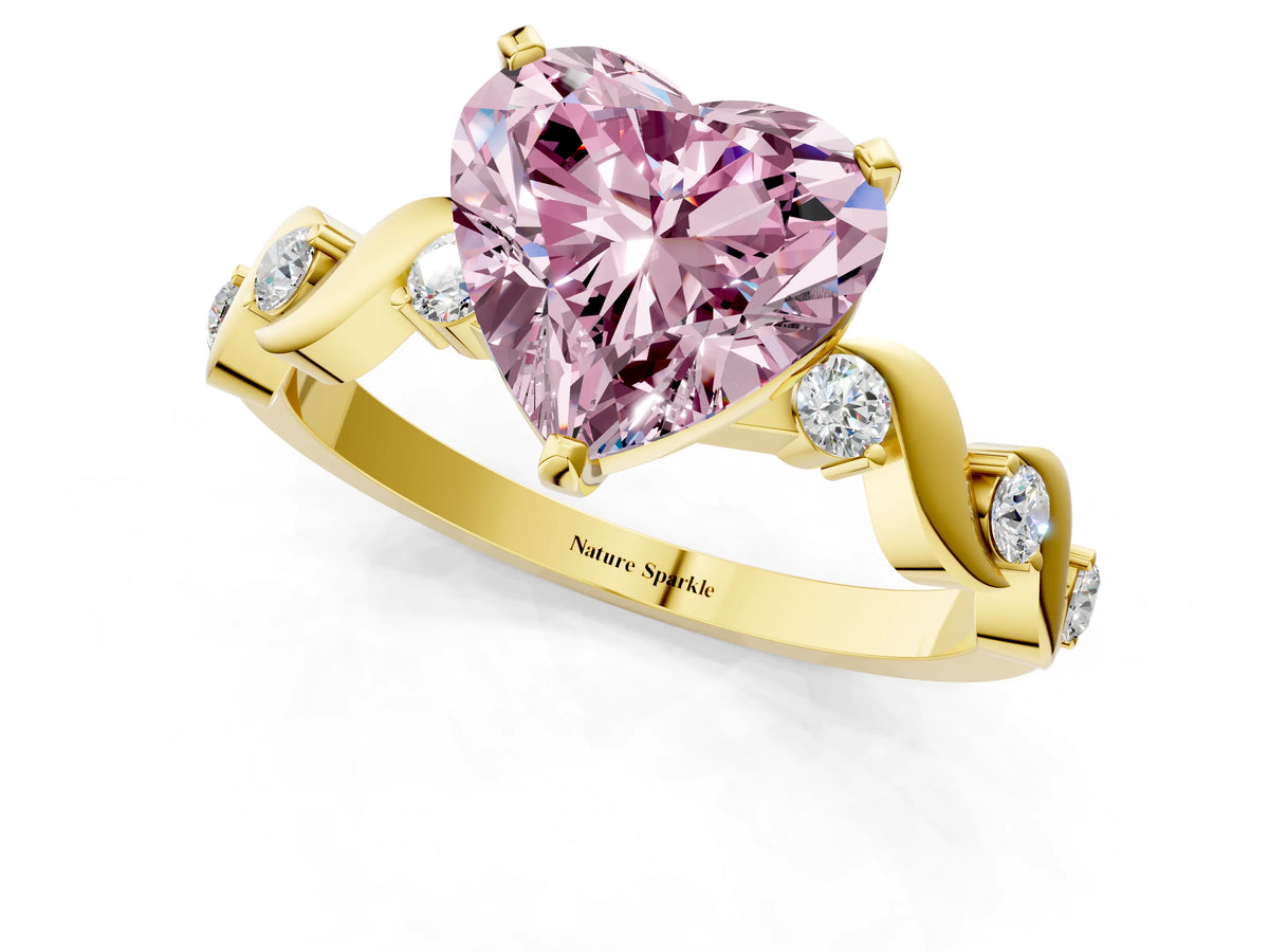 Fancy Pink Heart Cut Diamond Solitaire Ring in Yellow gold with Twisted Ribbon Band and Round Accents_1