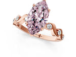 Fancy Pink Marquise Cut Diamond Solitaire Ring in Rose gold with Twisted Ribbon Band and Round Accents_1