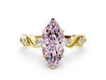 Fancy Pink Marquise Cut Diamond Solitaire Ring in Yellow gold with Twisted Ribbon Band and Round Accents