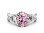 Fancy Pink Oval Cut Diamond Solitaire Ring in White gold with Interwoven Pavé Band and Prong Setting