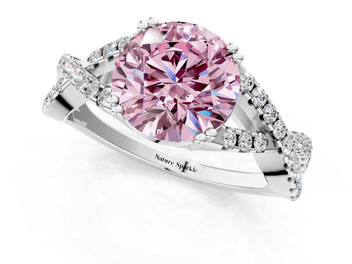 Fancy Pink Round Cut Diamond Solitaire Ring in White gold with Interwoven Pavé Band and Prong Setting_1