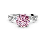 Fancy Pink Round Cut Diamond Solitaire Ring in White gold with Twisted Ribbon Band and Round Accents