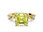 Fancy Yellow Asscher Cut Diamond Solitaire Ring in Yellow gold with Twisted Ribbon Band and Round Accents
