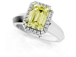 Fancy Yellow Emerald Cut Diamond Halo Ring in White gold with Cathedral Band and Prong Setting_1