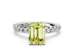 Fancy Yellow Emerald Cut Diamond Pavé Solitaire Ring in Silver with Round Pavé Band and Prong Setting