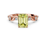 Fancy Yellow Emerald Cut Diamond Solitaire Ring in Rose gold with Twisted Ribbon Band and Round Accents