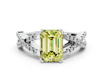 Fancy Yellow Emerald Cut Diamond Solitaire Ring in White gold with Interwoven Pavé Band and Prong Setting