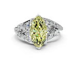 Fancy Yellow Marquise Cut Diamond Halo Ring in White gold with Marquise and Pavé Band in Prong Setting