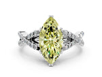 Fancy Yellow Marquise Cut Diamond Solitaire Ring in White gold with Interwoven Pavé Band and Prong Setting