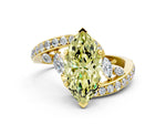 Fancy Yellow Marquise Cut Diamond Solitaire Ring in Yellow gold with Pavé Twist Band and Prong Setting