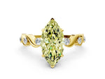 Fancy Yellow Marquise Cut Diamond Solitaire Ring in Yellow gold with Twisted Ribbon Band and Round Accents
